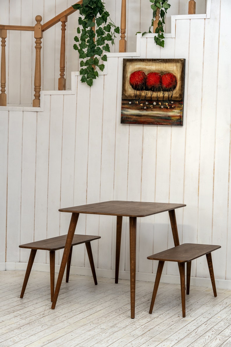 Here is Kitchen Small Walnut Wooden Dining Table Set! This Farmhouse Narrow Dine Table Benches in the dining room perfectly complements and change the cozy home atmosphere, offering a personalized touch to the kitchen.