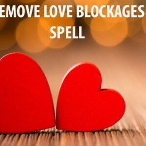 May include: Two red wooden hearts on a wooden surface with the text "REMOVE LOVE BLOCKAGES SPELL" above them.