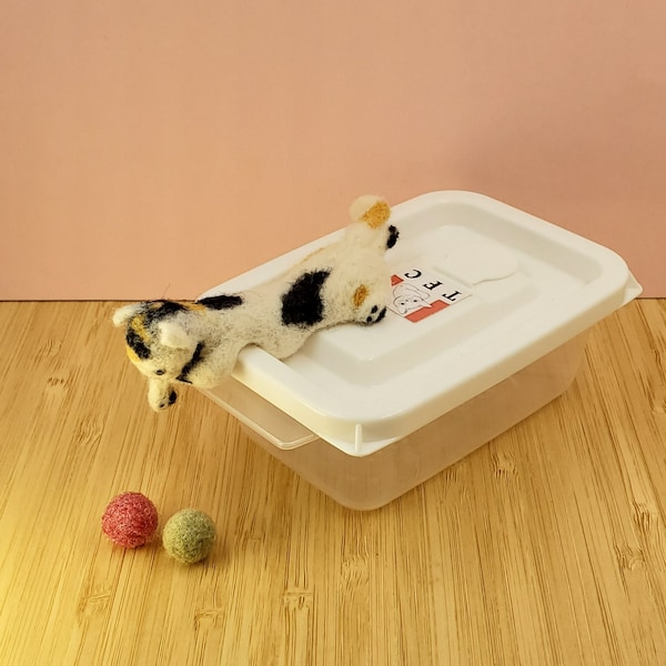 Needle Felted Miniature Calico Cat Chilling on a Plastic Storage Box