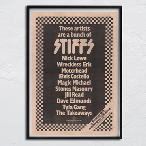 May include: A black and white poster with a checkered border. The poster advertises a compilation album called "A Bunch of Stiffs" featuring artists like Nick Lowe, Wreckless Eric, Motorhead, Elvis Costello, Magic Michael, Stones Masonry, Jill Read, Dave Edmunds, Tyla Gang, and The Takeaways.