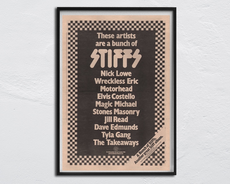 May include: A black and white poster with a checkered border. The poster advertises a compilation album called "A Bunch of Stiffs" featuring artists like Nick Lowe, Wreckless Eric, Motorhead, Elvis Costello, Magic Michael, Stones Masonry, Jill Read, Dave Edmunds, Tyla Gang, and The Takeaways.