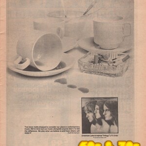 May include: A vintage magazine page featuring white teacups, saucers, and a sugar bowl. An ashtray with cigarette butts sits nearby. A small black and white photo of a band is also present. The text "60s & 70s Music-Fan" is in the bottom right corner.