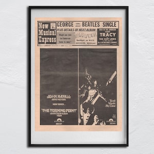 May include: A black and white newspaper clipping with a headline that reads "New Musical Express" and a subheading that reads "George talks about Beatles Single". The article features a photo of John Mayall, a British blues musician, playing a guitar. The text below the photo reads "John Mayall Joins Polydor Now Comes... The Turning Point John's New Album From Polydor 583 571".