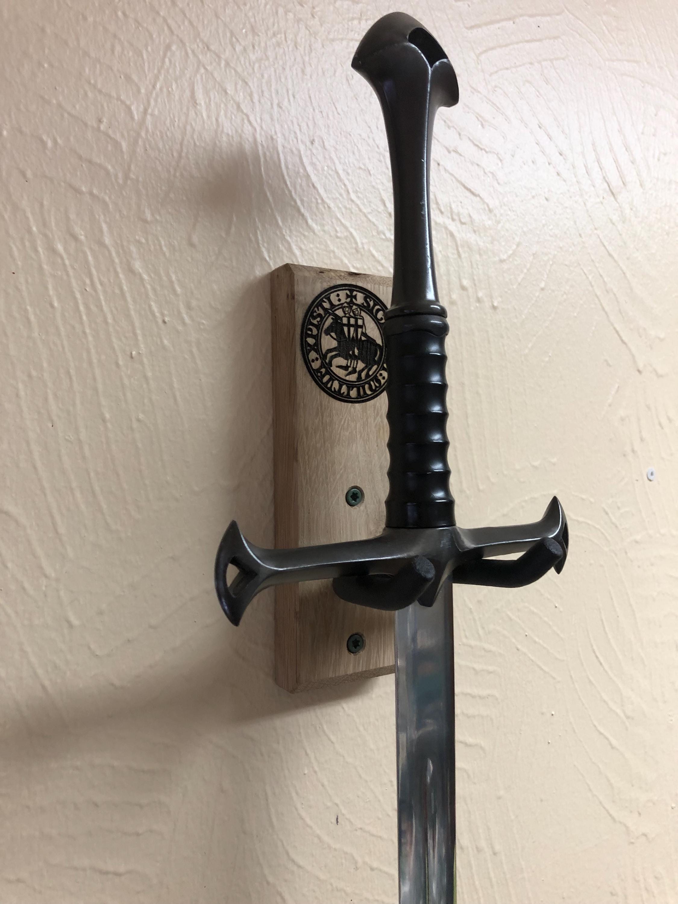 Heavy Duty oak sword wall mount with free laser engraving of your choice.