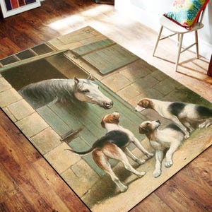May include: A rectangular area rug featuring a printed illustration of a white horse looking out from a green stable door toward three tricolor hounds. The scene depicts the animals on a stone-paved ground with a light-colored wall background.