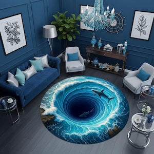 May include: A circular area rug featuring a high-contrast, three-dimensional graphic print of a deep blue ocean whirlpool with white crashing waves and two sharks swimming within the vortex, set against a dark blue living room floor.