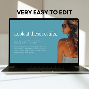 May include: A laptop computer screen displaying a blue background with the text "Look at these results." and a paragraph of text. The text reads: "Lorem ipsum dolor sit amet, consectetur adipiscing elit. Ut vel augue libero. Maecenas nec risus quis erat egestas maximus sed in sapien. Suspendisse pretium, augue vel auctor congue, magna sapien aliquam leo, nec eleifend neque diam at justo."