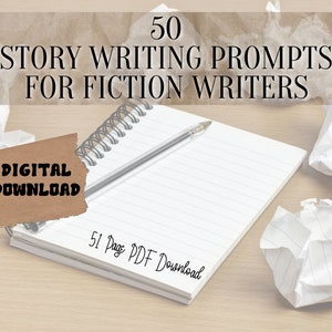 May include: A notebook with a pen on top of it, with crumpled paper balls on a wooden surface. The notebook has a spiral binding and lined paper. The text on the notebook says "50 Story Writing Prompts for Fiction Writers" and "51 Page PDF Download". A brown paper tag with the text "Digital Download" is attached to the notebook.