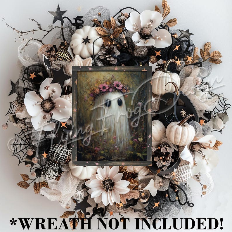 May include: A white ghost with a floral crown and large eyes is featured in a framed print. The print is surrounded by a wreath of white flowers, black mesh, and gold accents.
