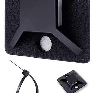May include: Black plastic cable clips with adhesive backing. The clips are designed to hold cables in place. The image also shows a black cable tie, but it is not included.
