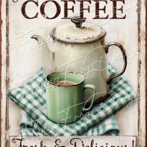 May include: A vintage-style metal sign with a white background and brown text that reads "Hot Coffee Fresh & Delicious!"  The sign features a green and white checkered tablecloth with a white teapot and a green mug filled with coffee.