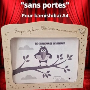 Peut inclure: Un cadre en bois pour histoires Kamishibaï A4, avec le texte "Cadre à Histoires" et "sans portes". Il présente une illustration de corbeau sur une branche, avec le texte "LE CORBEAU ET LE RENARD".