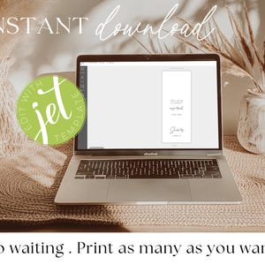 May include: A laptop displaying a digital template with the text "Your words are requested for you". The image includes the words "Instant Download" and "Edit with Jet Template". The laptop sits on a woven mat with decorative vases in the background.