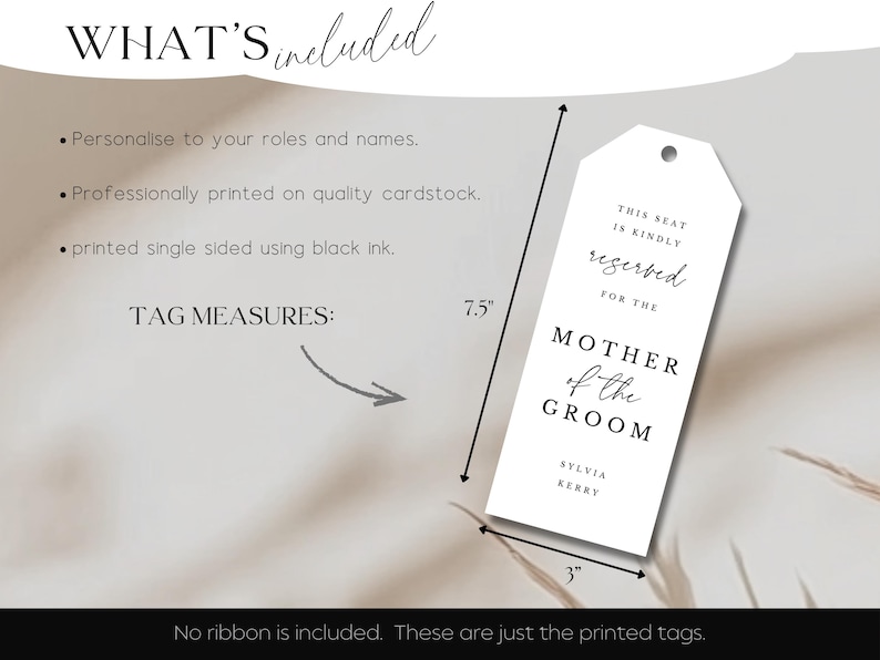 May include: A white tag with the text "THIS SEAT IS KINDLY reserved FOR THE MOTHER of the GROOM" and the names Sylvia Kerry. The tag measures 7.5 inches long and 3 inches wide. The text is printed in black ink.
