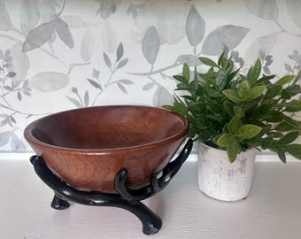 Vintage wooden snack bowl on a heavy metal antler stand. Made in India.