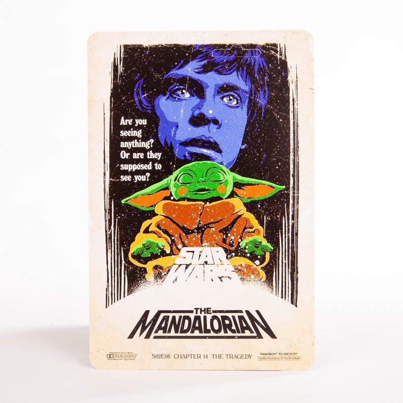 May include: A vintage-style Star Wars: The Mandalorian poster featuring Luke Skywalker and Grogu (Baby Yoda). The poster has a distressed look with the text "Are you seeing anything? Or are they supposed to see you?" and "The Mandalorian".
