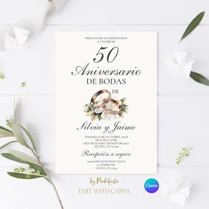 May include: An invitation card for a 50th wedding anniversary, featuring gold wedding rings with floral accents. The text includes the names Silvia and Jaime, along with event details. The card is on a white background with decorative elements.