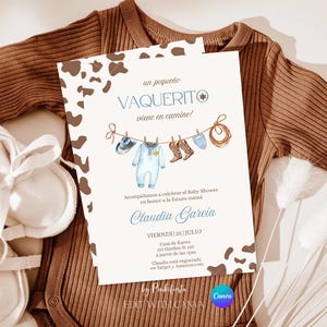 May include: A baby shower invitation with a cowboy theme. The invitation features a watercolor illustration of cowboy-themed baby clothes hanging on a clothesline. The text reads "un pequeño VAQUERITO viene en camino!" and includes event details.