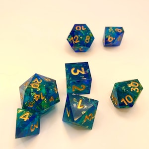 sinking treasure- iridescent blue gold and turquoise dnd dice