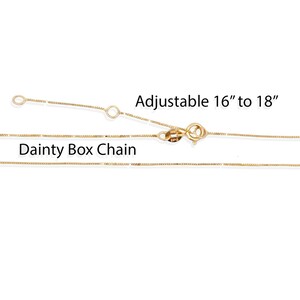May include: A delicate gold-colored box chain necklace. The necklace is adjustable from 16 to 18 inches. The text "Dainty Box Chain" is displayed below the necklace.