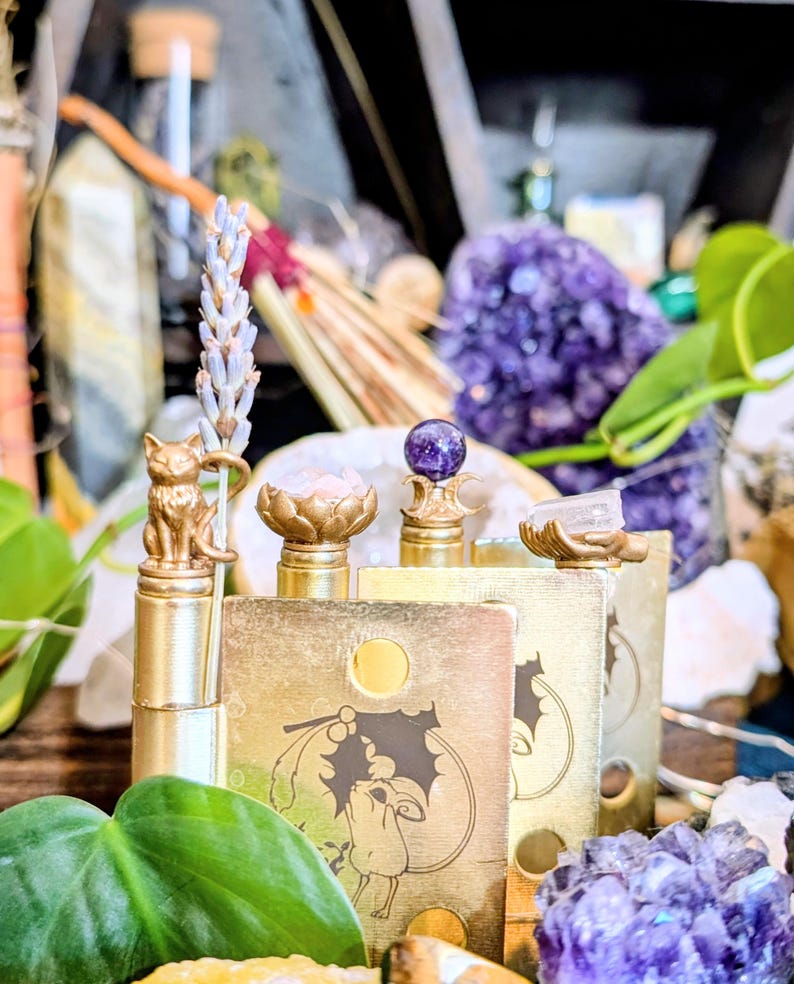CottageCoreHolly Witch Divination Hinge Head Bundle displayed with natural elements: cat with lavender, lotus bowl with rose, salt bowl, and crescent moon crystal stand