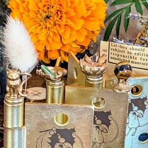 Cottagecore witch door hinge decorations with wheat, rosemary, cinnamon, and tiger eye altar tools for spiritual manifestation home decor
