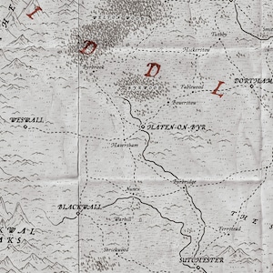 Detail picture of a fantasy map using the wayfinder font for place names