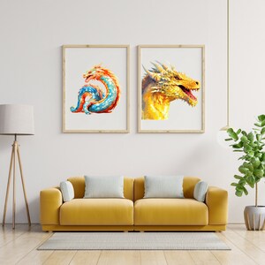 May include: Two framed prints of colorful dragon illustrations. The print on the left shows a blue and orange dragon curled up. The print on the right shows a yellow dragon with its mouth open.
