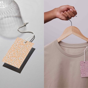 Split image showing floral confetti tags in use—left side displays an orange floral tag resting near a glass cup, while the right shows a burgundy floral tag hanging from a beige t-shirt on a wooden hanger