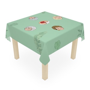 Golden Girls At The Table With Cheesecake Tablecloth (Pastel Colors) in Cartoon Style Art