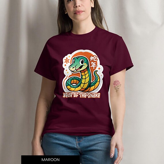 Camiseta unisex clásica de algodón con diseño gráfico del año de