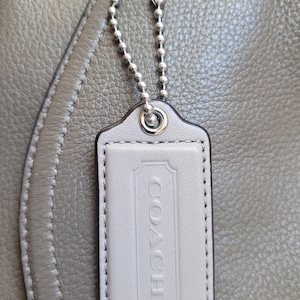 Coach Hang Tag Large Cream Pearl Ivory Beige Smooth Leather Finish Silver tone Hardware Length 2.5&#39;&#39; Keychain Bag Charm Accessory