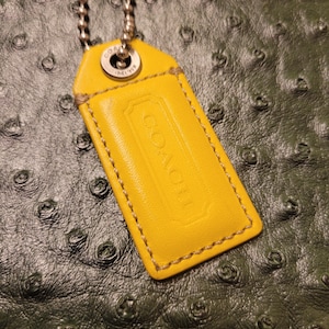 Coach Genuine Cowhide Leather Hang Tag 2 Tone Charm Yellow Face & Light Tan Back with Silver tone Hardware Keychain Bag Accessory Size 2.5&#39;&#39;