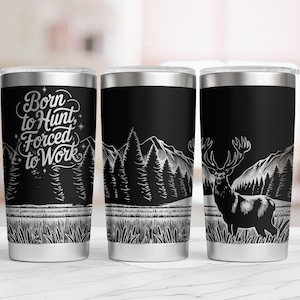 May include: Three stainless steel tumblers with black and white designs. The tumbler on the left has the text "Born to Hunt, Forced to Work" with a forest scene. The tumbler in the middle has a forest scene. The tumbler on the right has a deer in a forest scene.