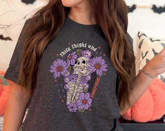 Funny Skeleton Thick Thighs and Spooky Vibes T-Shirt, Retro Halloween Shirt, Floral Skeleton Funny Saying Tee, Funny Saying Gym Shirt