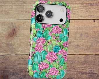 May include: A rectangular smartphone case featuring a vibrant, repeating pattern of green cacti and bright pink blooming flowers. The case has a large, rectangular camera cutout at the top, revealing the phone's triple-lens camera system.