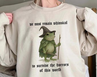 We Must Remain Whimsical Shirt,Trending Unisex Tee Shirt,Unique Shirt Gift,Whimsical Frog Wizard Sweatshirt,Cute Fantasy Frog Witch Hoodie