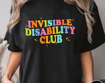 May include: Black t-shirt with the text "INVISIBLE DISABILITY CLUB" in rainbow colors.