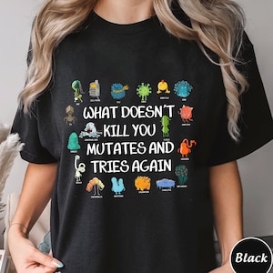 May include: Black t-shirt featuring a graphic of various microbes and the text "What doesn't kill you mutates and tries again".