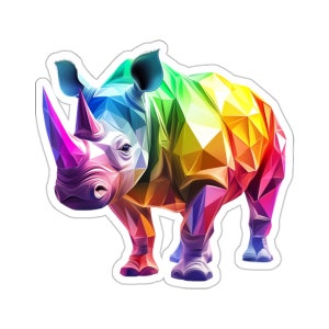 May include: A colorful sticker featuring a geometric rhino design. The rhino is rendered in a vibrant spectrum of colors, including pink, purple, blue, green, yellow, and red. The sticker has a white border.