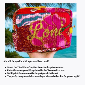 May include: A quilted pouch with a vibrant floral pattern in red, pink, and brown. The name "Loni" is displayed in gold glitter lettering across the front. The pouch is held up against a background of palm trees and blue sky.