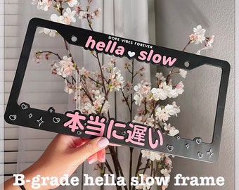 B-grade Pink Hella Slow License Plate Frame