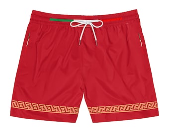 May include: Red swimming trunks with a white and green stripe and a gold Greek key pattern around the bottom.