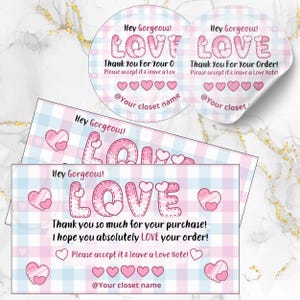 May include: Pink and blue plaid stationery set with the word "LOVE" in a stitched design. The set includes stickers and cards with the text "Hey Gorgeous!" and "Thank You For Your Order!"