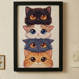 May include: A framed print featuring four cartoon cat faces stacked vertically. The cats have large, expressive eyes in shades of orange, blue, and brown. The top cat is black, followed by a white and tan cat, a gray cat, and an orange tabby cat.