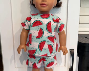18 inch doll flannel Pajamas. Watermelon print. Hook and loop enclosure on top and elastic on the shorts for easy on and off.