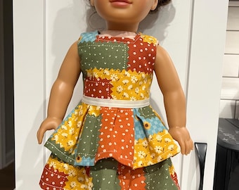 18 inch doll dress, adorable fall/Thanksgiving theme, white ribbon accent.  Hook and loop enclosure for easy on and off.