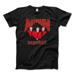 May include: Black t-shirt with a red graphic of a band called "Autobahn Nagelbett". The graphic features three men in red shirts with black hair.