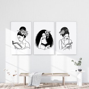 May include: Three black and white illustrations of women reading books. Each woman has a different hairstyle and is wearing a floral crown. The illustrations are set against a white background.