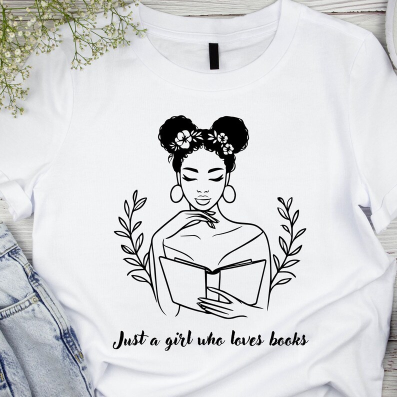 May include: Black and white illustration of a woman with flowers in her hair reading a book. The text "Just a girl who loves books" is below the image.